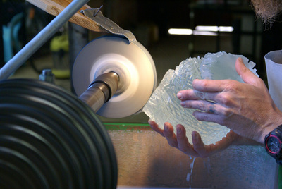 Now the eyes are ground. This is done by using a silicon carbide stone.