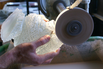 Pre-polishing is done with a poplar wood wheel and polishing paste.