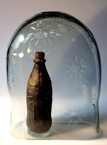 Hand blown and cut glass, bronze